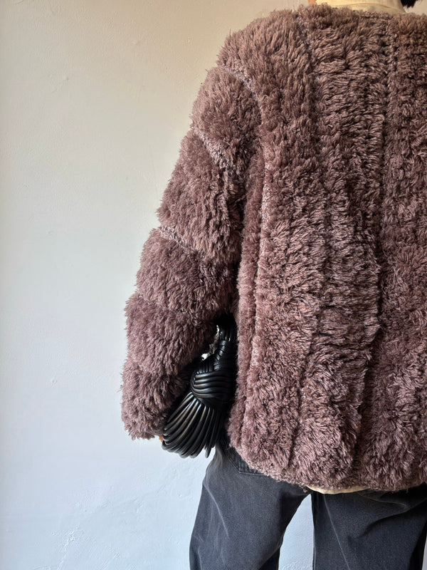 Brown chunky knit cardigan.