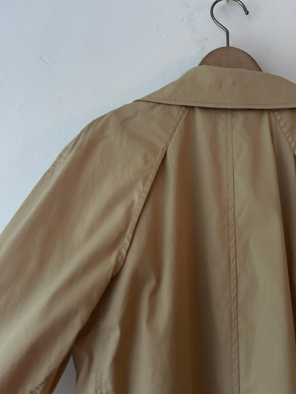DONN AKARAN trench coat.