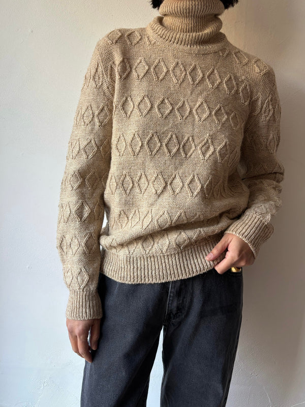 High neck beige knit.