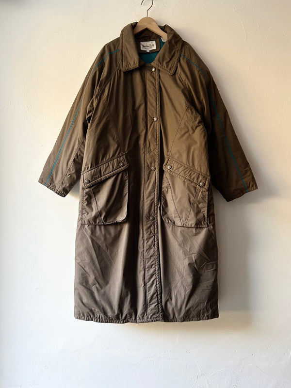 Light brown long down coat.