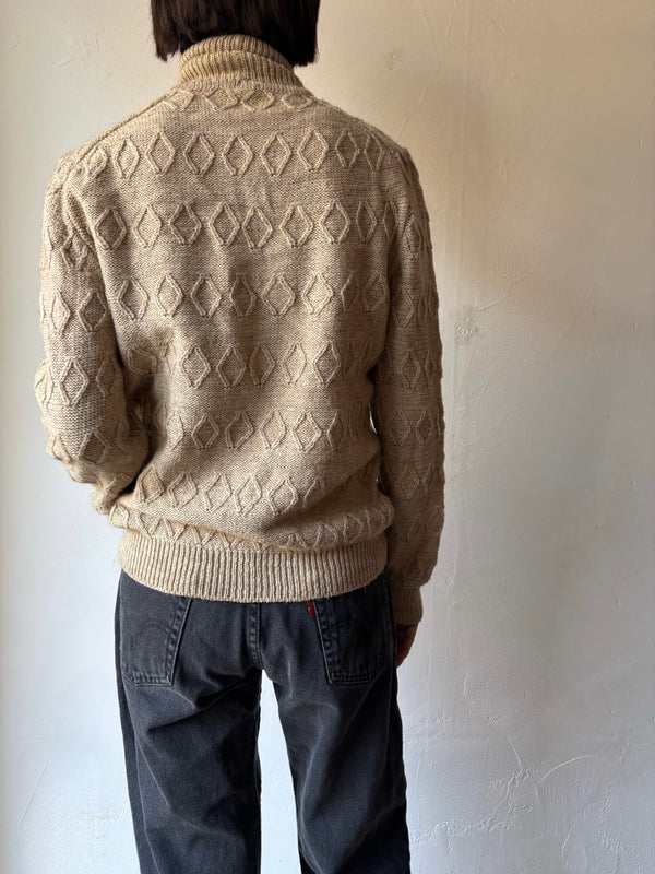 High neck beige knit.