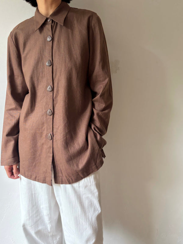 Brown linen leaf button shirt.