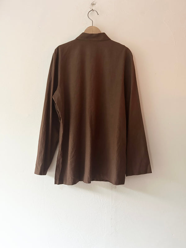 Brown linen leaf button shirt.