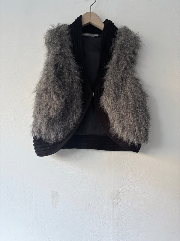 Silver fur vest.