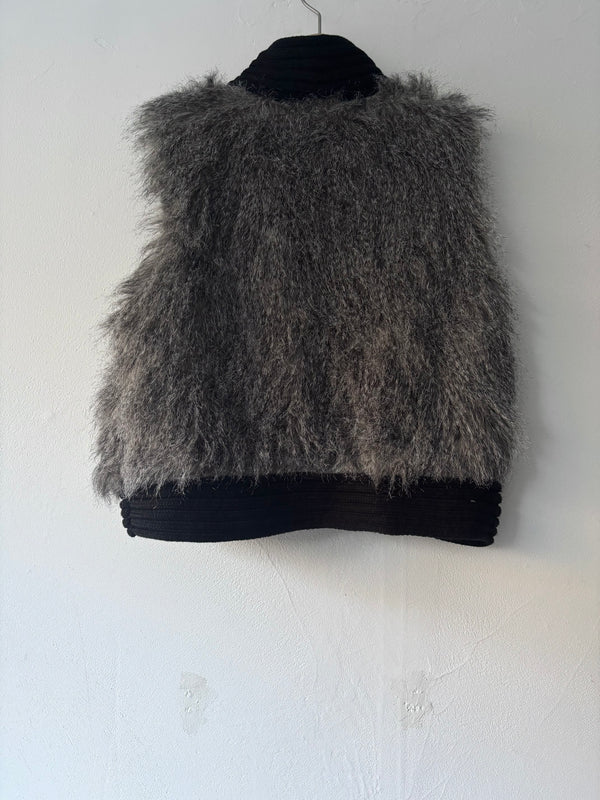 Silver fur vest.