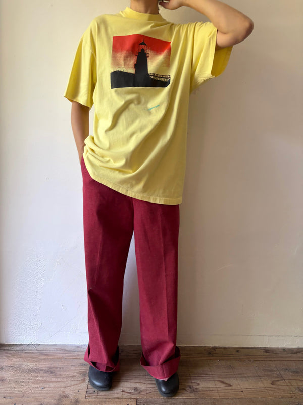 90' light house yellow tee.