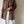 Brown linen leaf button shirt.を表示

