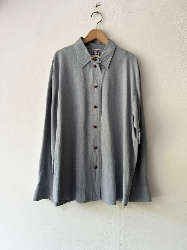 Blue longsleeve blouse.