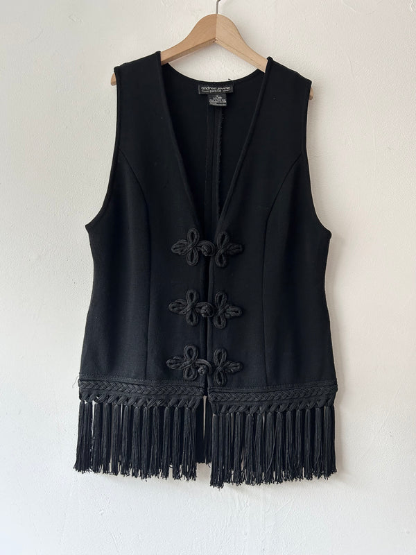 Black fringe knit vest.