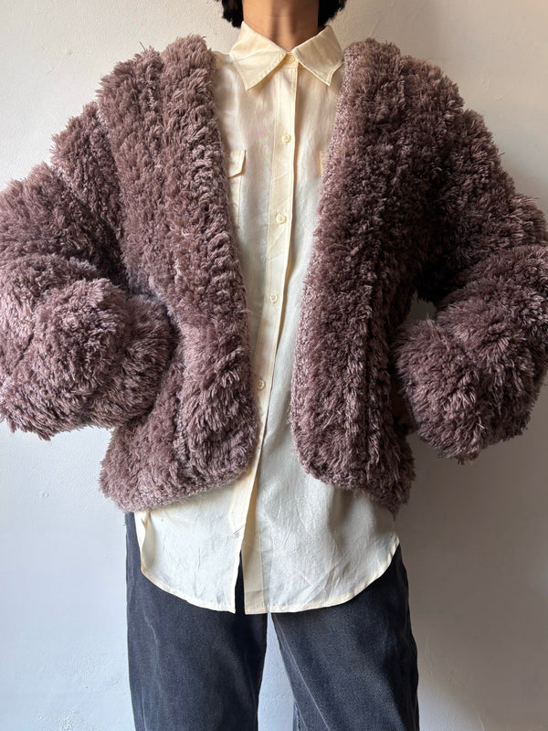 Brown chunky knit cardigan.