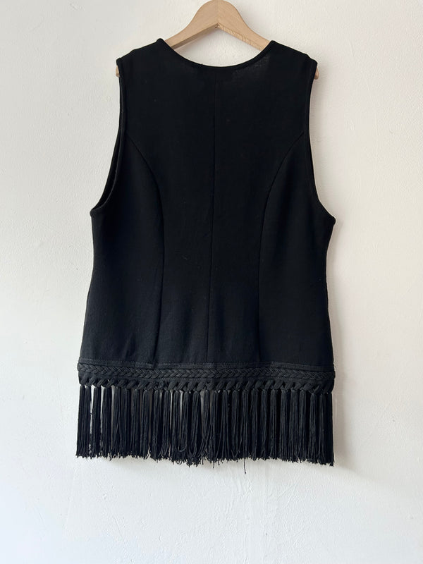 Black fringe knit vest.