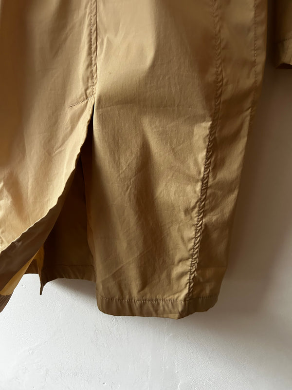DONN AKARAN trench coat.