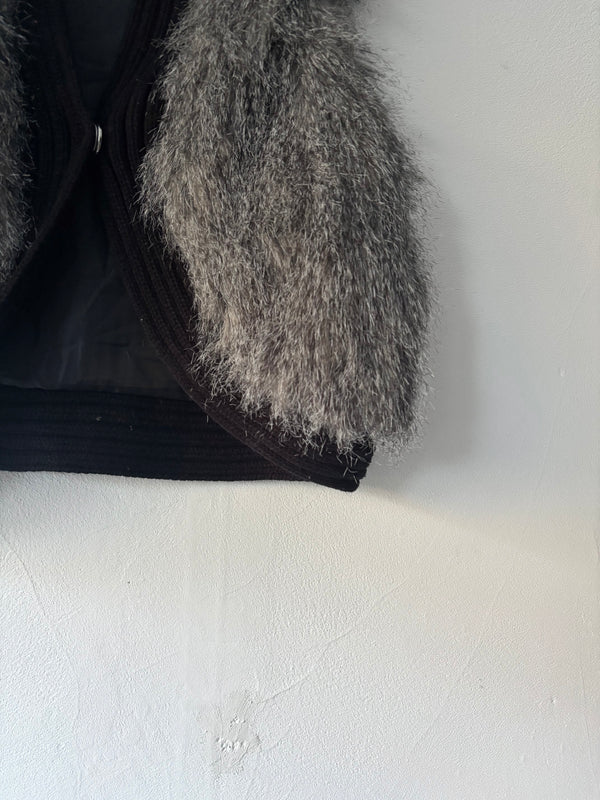 Silver fur vest.