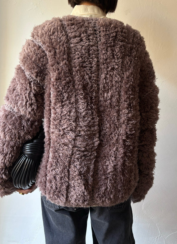 Brown chunky knit cardigan.