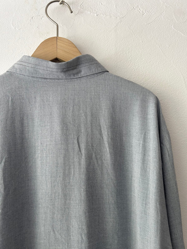 Blue longsleeve blouse.