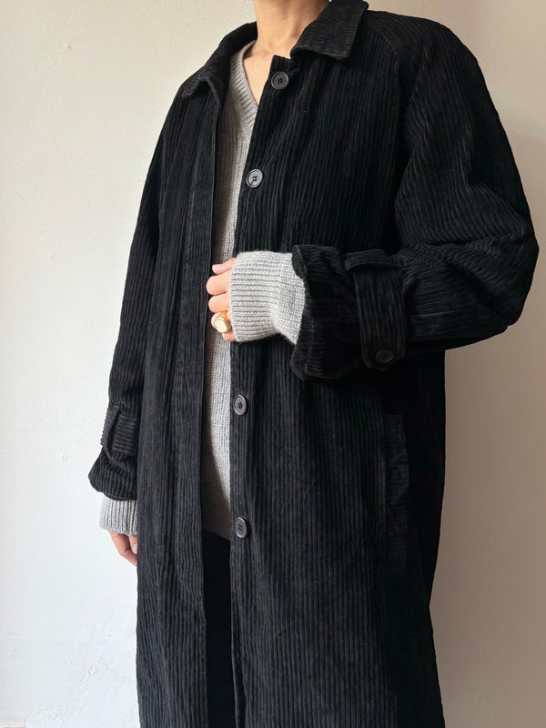 Corduroy black long coat.