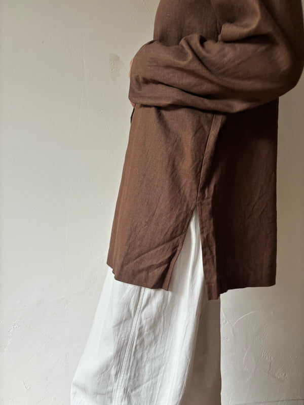 Brown linen leaf button shirt.