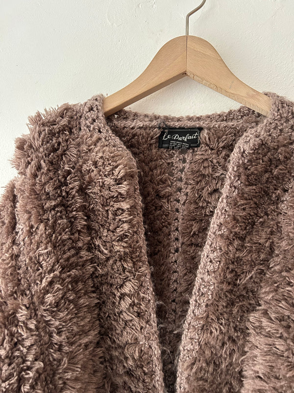 Brown chunky knit cardigan.