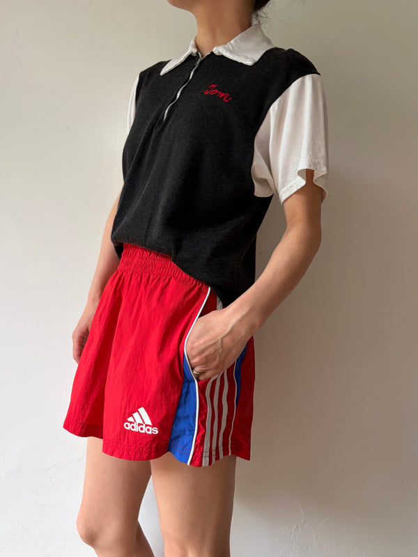 Adidas Red Color shorts.