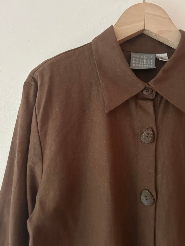 Brown linen leaf button shirt.