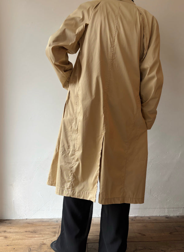 DONN AKARAN trench coat.