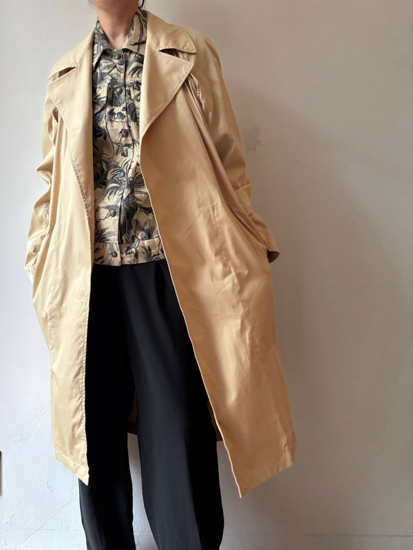 DONN AKARAN trench coat.