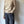 High neck beige knit.を表示
