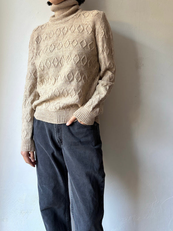 High neck beige knit.