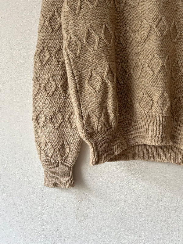 High neck beige knit.