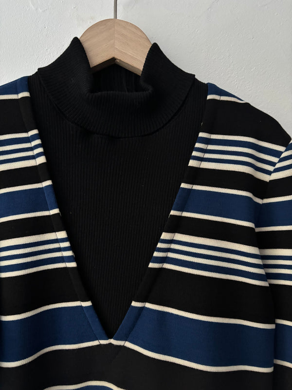 High neck striped knit.