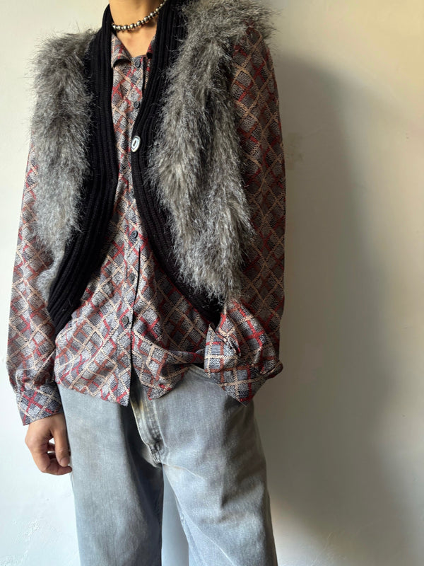 Silver fur vest.