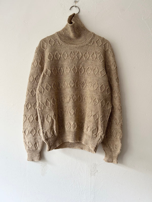 High neck beige knit.