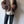 Brown chunky knit cardigan.を表示
