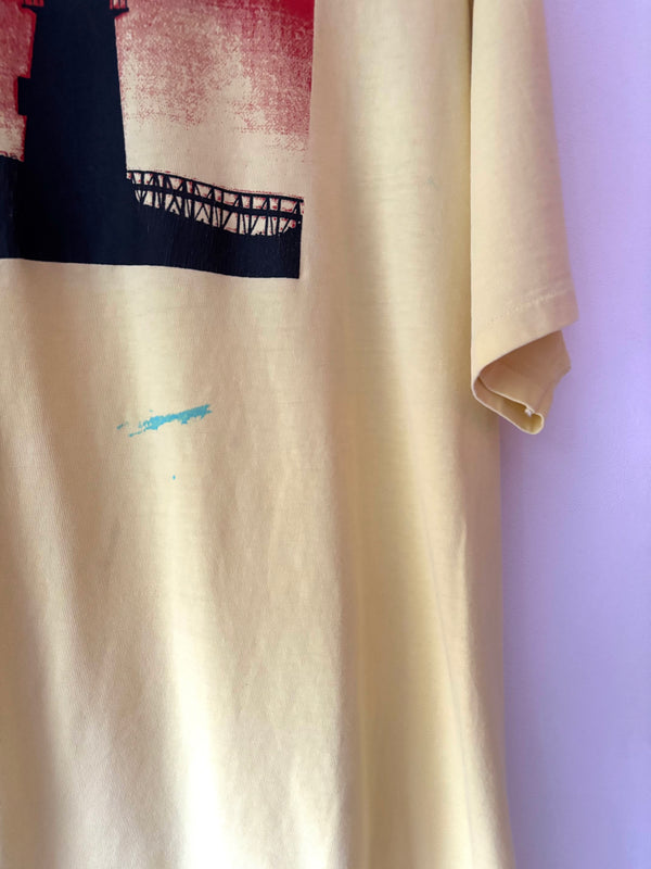 90' light house yellow tee.