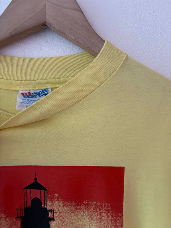 90' light house yellow tee.