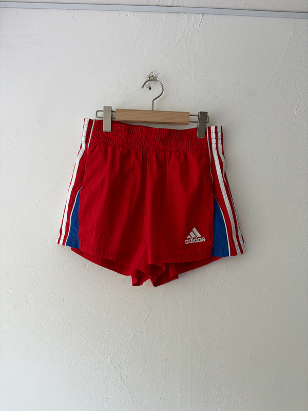 Adidas Red Color shorts.