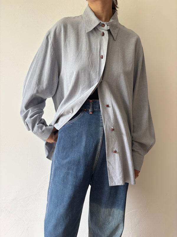 Blue longsleeve blouse.