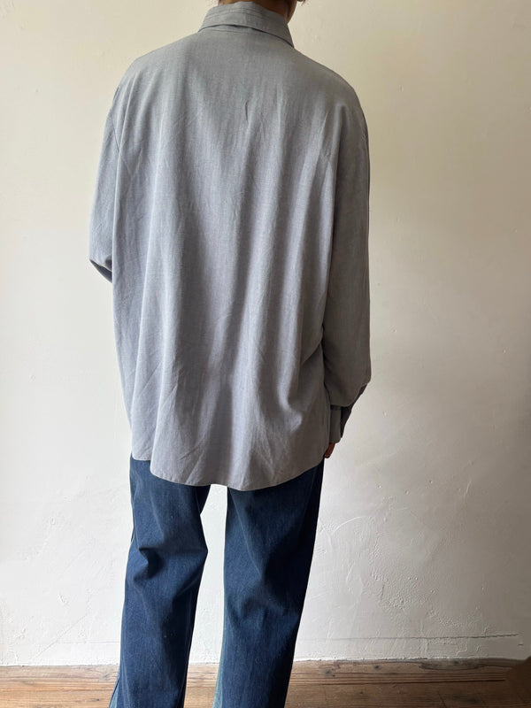 Blue longsleeve blouse.