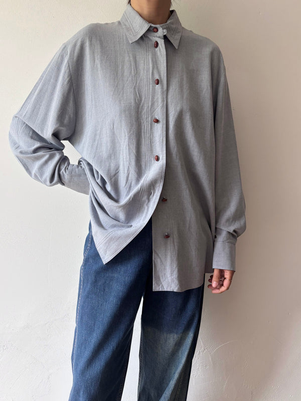 Blue longsleeve blouse.